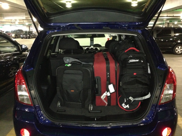 Team Titleist doesn't travel light. The rental...