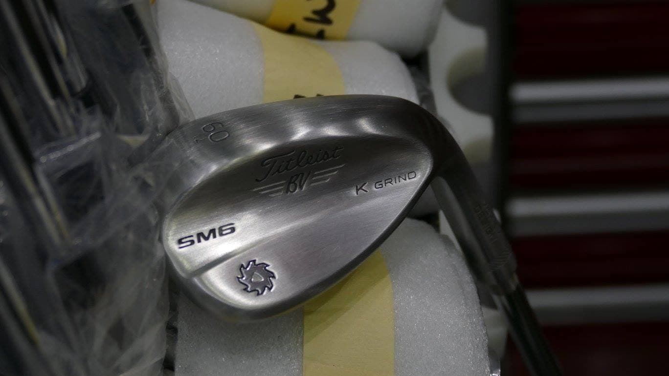 Meanwhile, inside, Vokey Wedges' Aaron Dill...