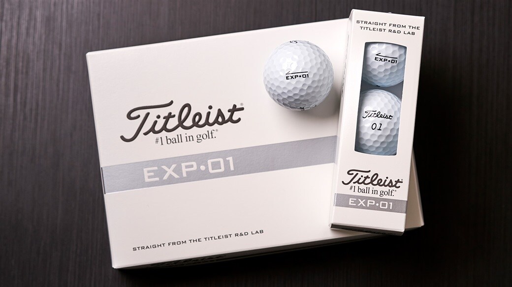Photo of new Titleist EXP&bull;01 golf ball dozen, 3-ball sleeve and single ball